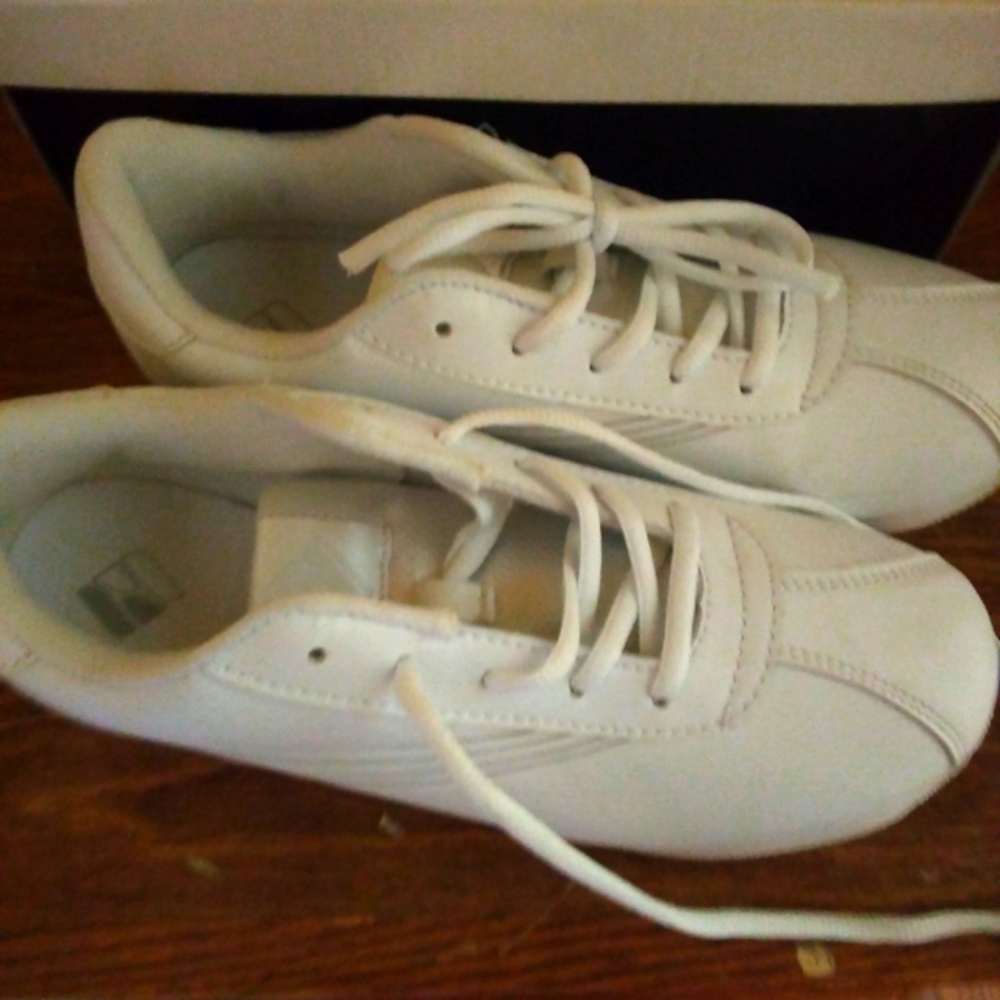 Fierce fears cheerleading shoes.  Brand new in box.9.5 white.